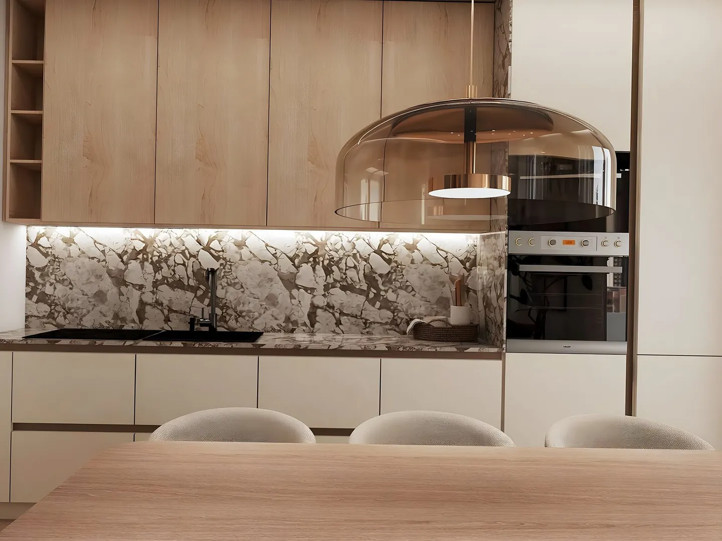 Cocina con isla y frente de mármol en Cardedeu